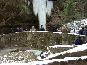 One of the many spectacular scenes that draws oohs and ahs from kids on hiking through Ohio's Hocking Hills in winter is the trek past Devil's Bathtub at Old Man's Cave.