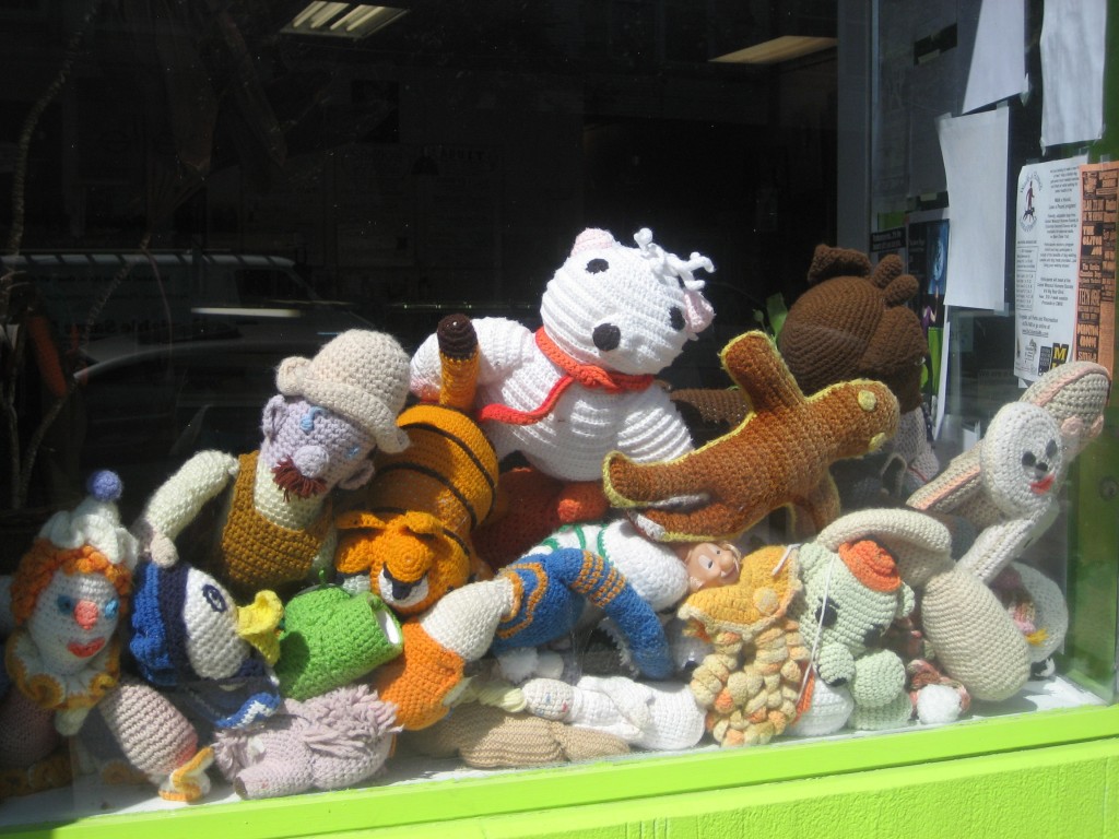 Stuffed animals in the window at Sparky's. 