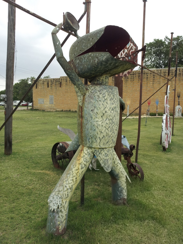 Our nomination for "Best place to place a cache" near the public bathrooms in Lucas, KS