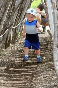 kid playing outdoors at the outdoor campus in sioux falls