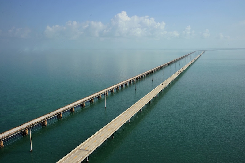 The Seven Mile Bridge looking north towards Marathon, Florida February 22, 2011. The Seven Mile Bridge connects Knight's Key (part of the city of Marathon, Florida) in the Middle Keys to Little Duck Key in the Lower Keys. Among the longest bridges in existence when it was built, it is one of the many bridges on US 1 in the Keys, where the road is called the Overseas Highway. AFP PHOTO/Karen BLEIER (Photo credit should read KAREN BLEIER/AFP/Getty Images)