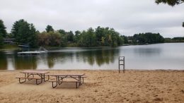 Picnic tables and swimming docks for a fun afternoon at South Park beach. Photo by Leia Cullen